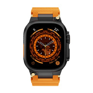 Bracelet silicone orange et noir avec détails or, style technique, pour Apple Watch, modèle Wagner.