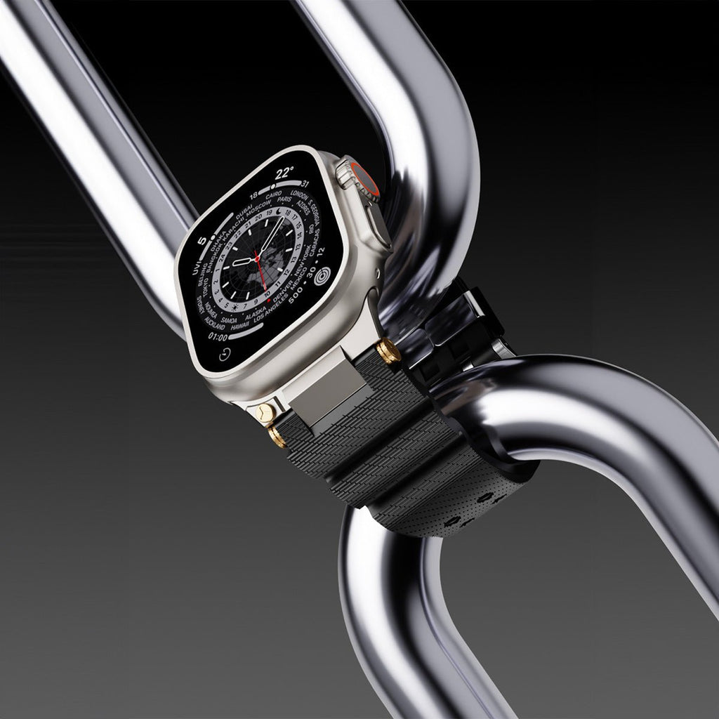 Bracelet Apple Watch noir en silicone avec détails or, aspect technique et ajustable, modèle Wagner.