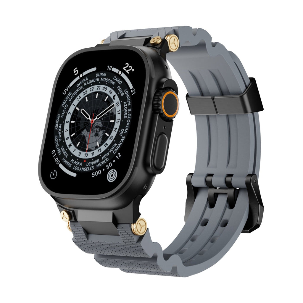 Bracelet Apple Watch gris en silicone technique avec détails or et boucle noire ajustable.