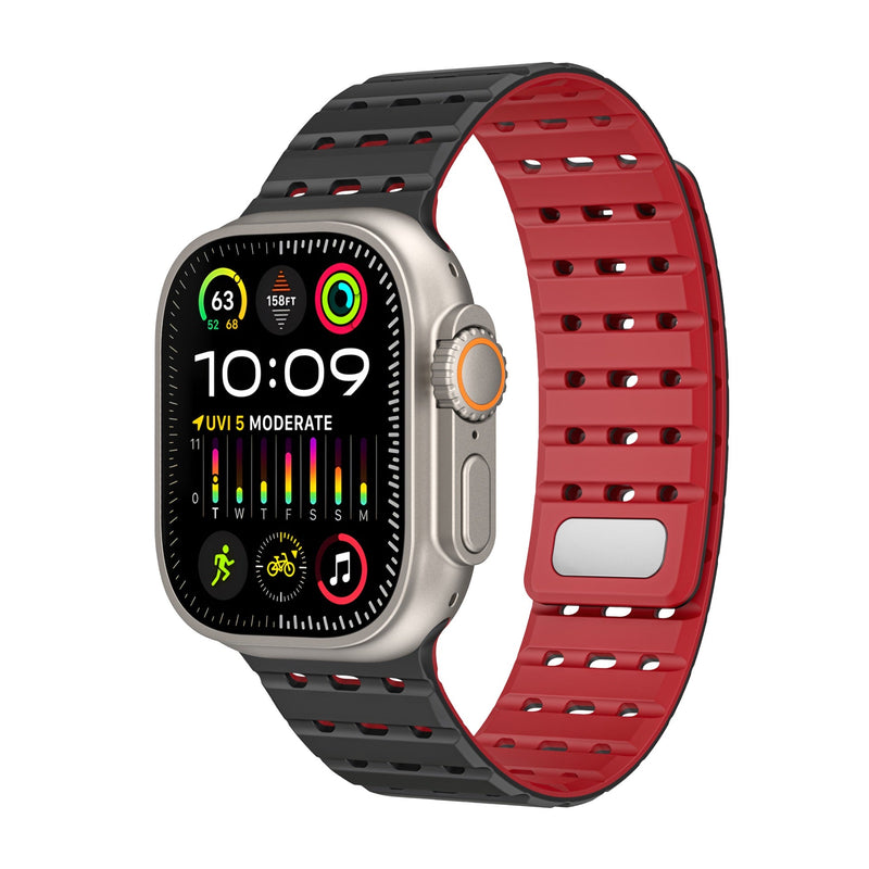 Bracelet silicone noir extérieur et rouge intérieur, style sportif et perforé, pour Apple Watch.