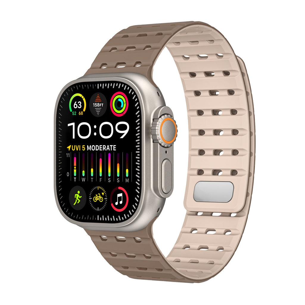 Bracelet en silicone beige ajustable au style sportif pour Apple Watch, perforations et boucle métallique.