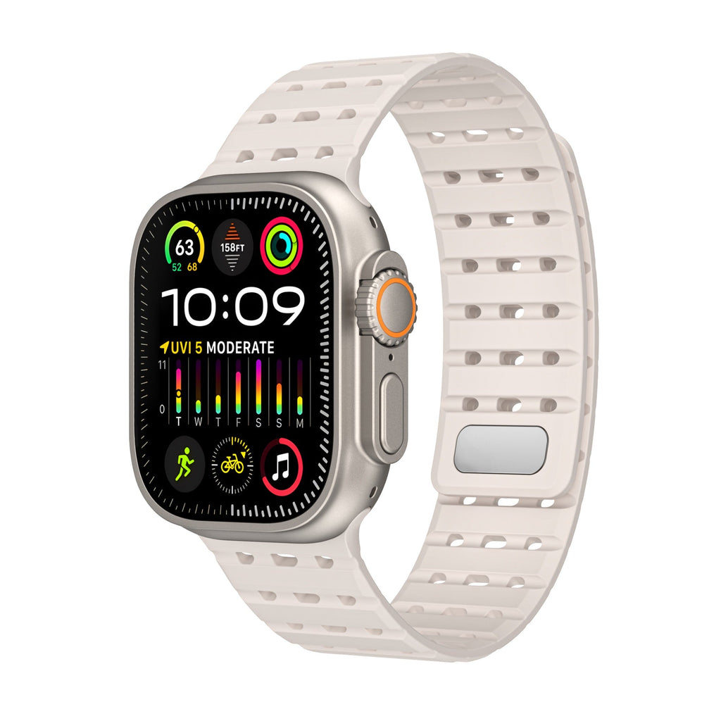 Bracelet silicone beige sport ajustable pour Apple Watch, perforé et résistant à l'eau.