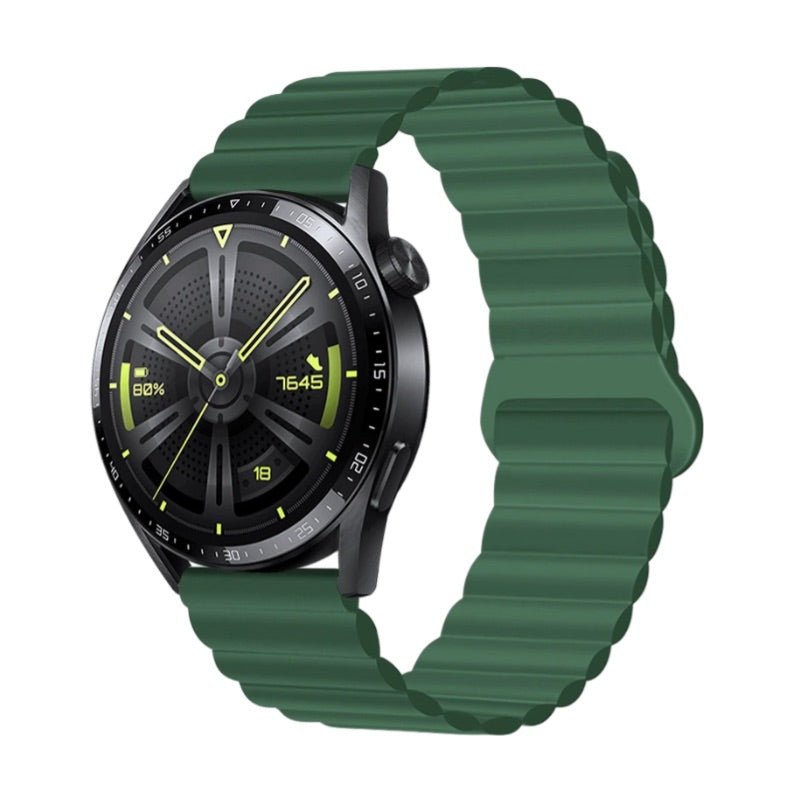 Montre connectée Huawei Watch avec bracelet silicone vert foncé ondulé et fermoir magnétique noir.