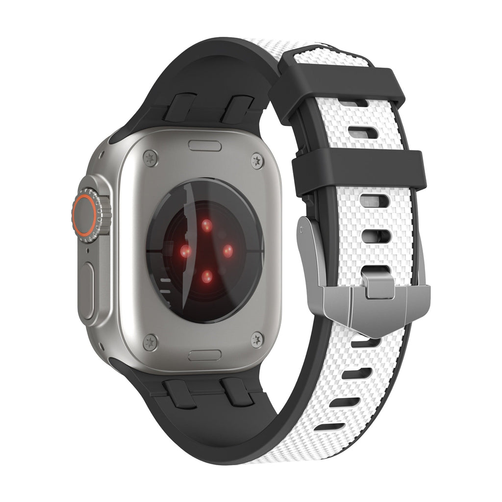 Bracelet en silicone noir et blanc texturé, boucle argentée ajustable pour Apple Watch.