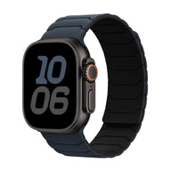 Bracelet silicone magnétique noir mat, ajustable pour Apple Watch, design pro et robuste.