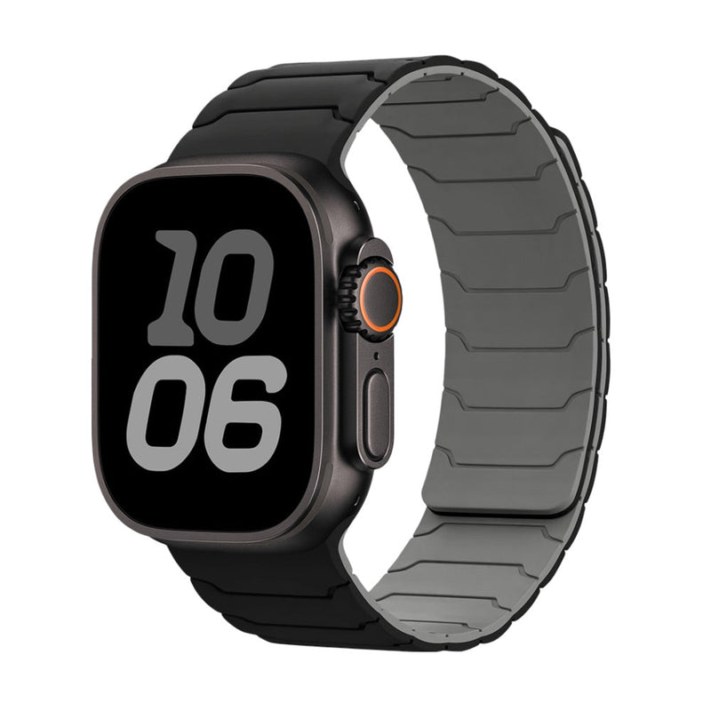 Bracelet magnétique silicone noir mat ajustable pour Apple Watch, design pro, intérieur gris clair.