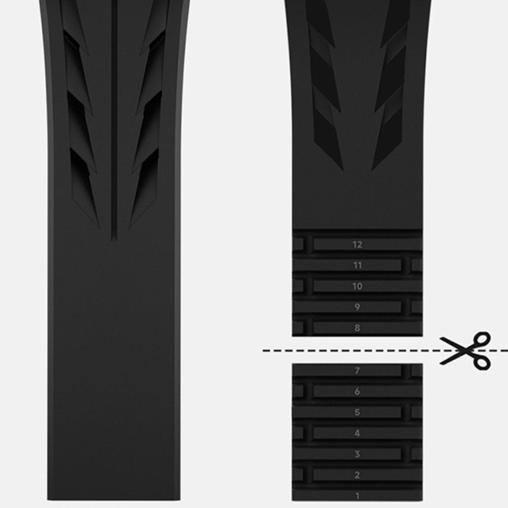 Bracelet en silicone noir pour Apple Watch avec détails texturés et fermeture papillon ajustable.