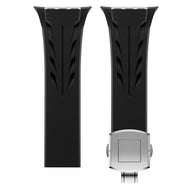 Bracelet Apple Watch en silicone noir avec fermeture papillon argentée ajustable.