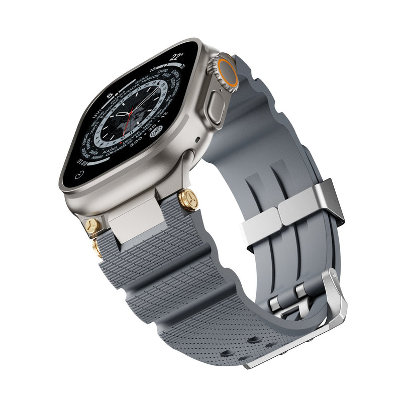 Bracelet en silicone gris avec boucle double ardillon argentée pour Apple Watch.