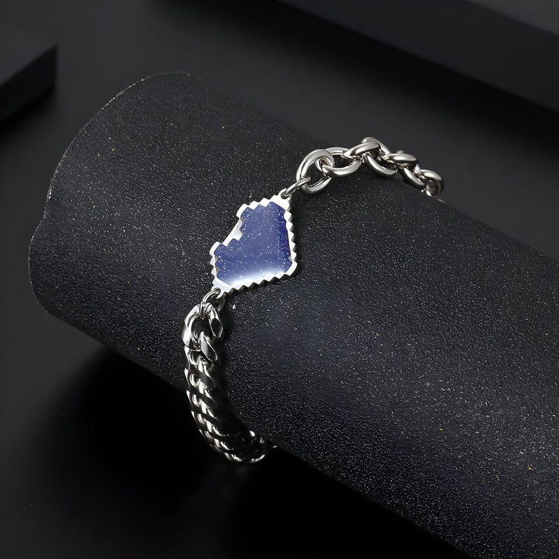 Bracelet en titane argenté tressé avec pendentif cœur bleu pour homme, modèle Mike.