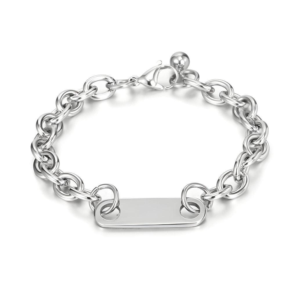 Bracelet gourmette en titane argenté avec chaîne maillons ronds et plaque personnalisable.