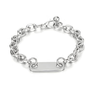 Bracelet gourmette en titane argenté avec chaîne maillons ronds et plaque personnalisable.
