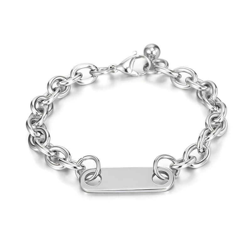 Bracelet gourmette en titane argenté avec chaîne maillons ronds et plaque personnalisable.