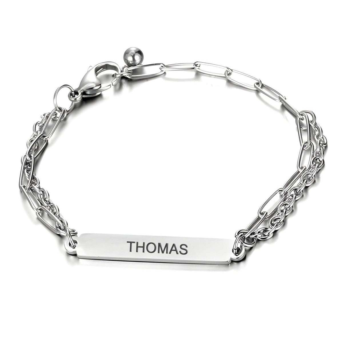 Bracelet gourmette en titane argenté, maille forçat double, plaque gravée Thomas, fermoir mousqueton.