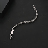 Bracelet gourmette en titane argenté, maille spiga fine, fermoir mousqueton robuste, modèle Swann.