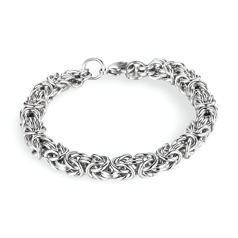 Bracelet homme en titane argenté avec maille byzantine épaisse et fermoir mousqueton robuste.