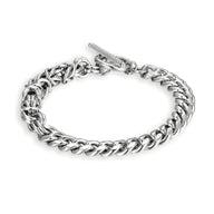 Bracelet homme en titane argenté avec maille cubaine entremêlée et fermoir bascule robuste.