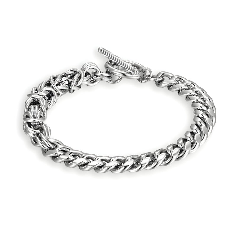 Bracelet homme en titane argenté avec maille cubaine entremêlée et fermoir bascule robuste.