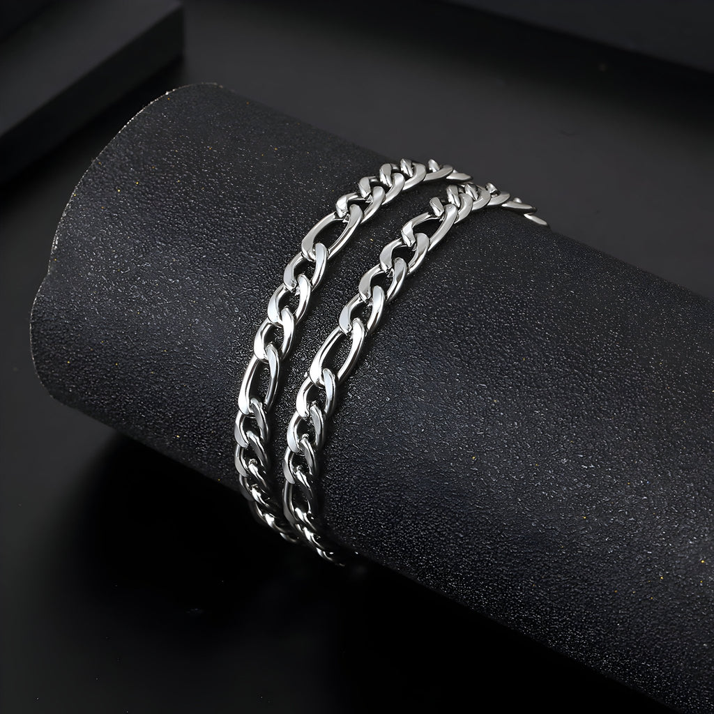 Bracelet homme en titane argenté, maille figaro double, finition polie brillante, style moderne.