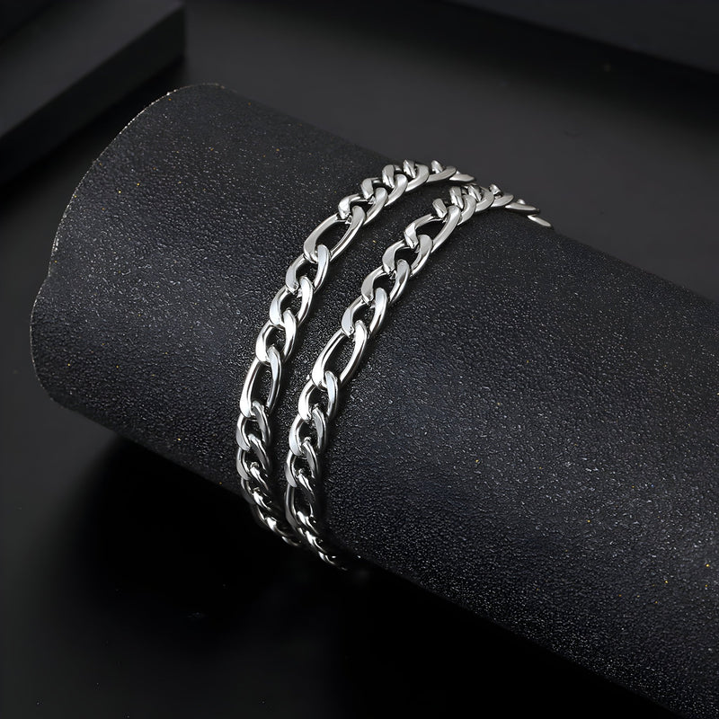 Bracelet homme en titane argenté, maille figaro double, finition polie brillante, style moderne.