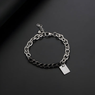 Bracelet homme en titane argenté, maille forçat et cubaine, avec plaquette rectangulaire lisse.