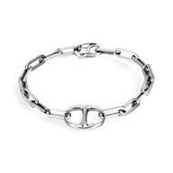 Bracelet homme en titane argenté avec maille forçat et maillon central ovale lisse.
