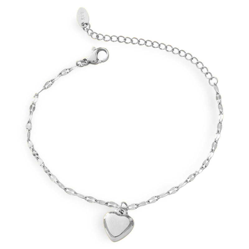 Bracelet en titane argenté avec petit pendentif cœur lisse et chaîne fine élégante.