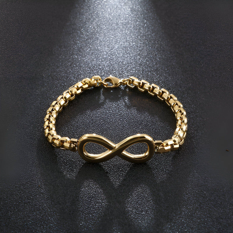 Bracelet en titane doré avec motif infini lisse et maillons épais élégants.