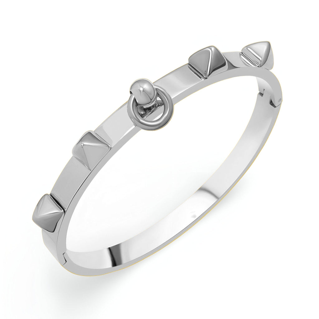 Bracelet rigide en titane argenté avec détails à piques géométriques modèle Louise.