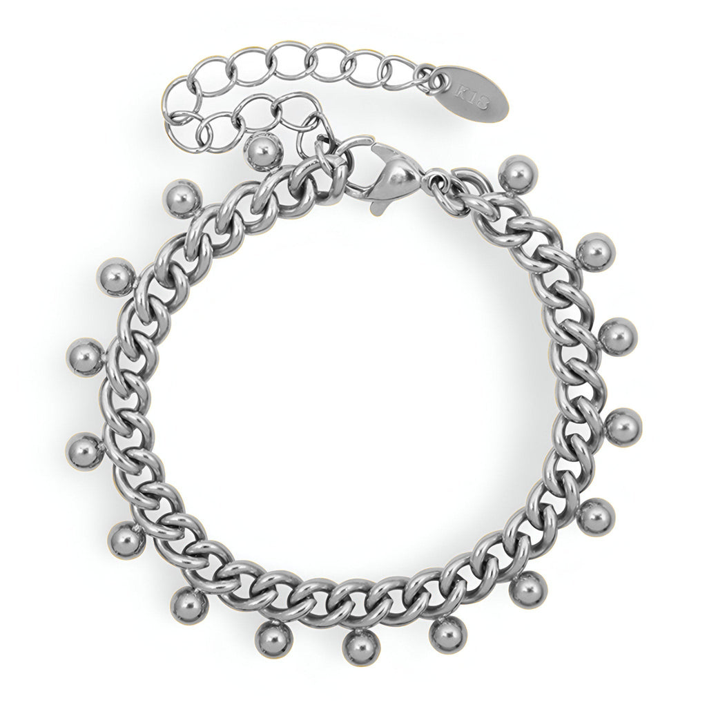 Bracelet en titane argenté chaîne épaisse avec petites perles rondes suspendues.