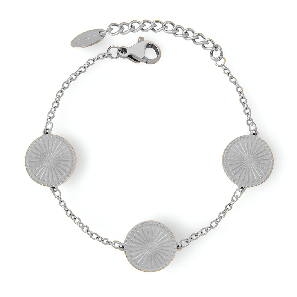 Bracelet en titane argenté avec trois médaillons ronds rayonnants et chaîne fine ajustable.