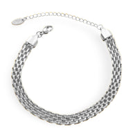 Bracelet femme chaîne en titane plaqué argent style montre avec fermoir maille tressée.