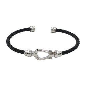 Bracelet jonc fer à cheval en câble torsadé noir avec fermoir en acier inoxydable argenté.