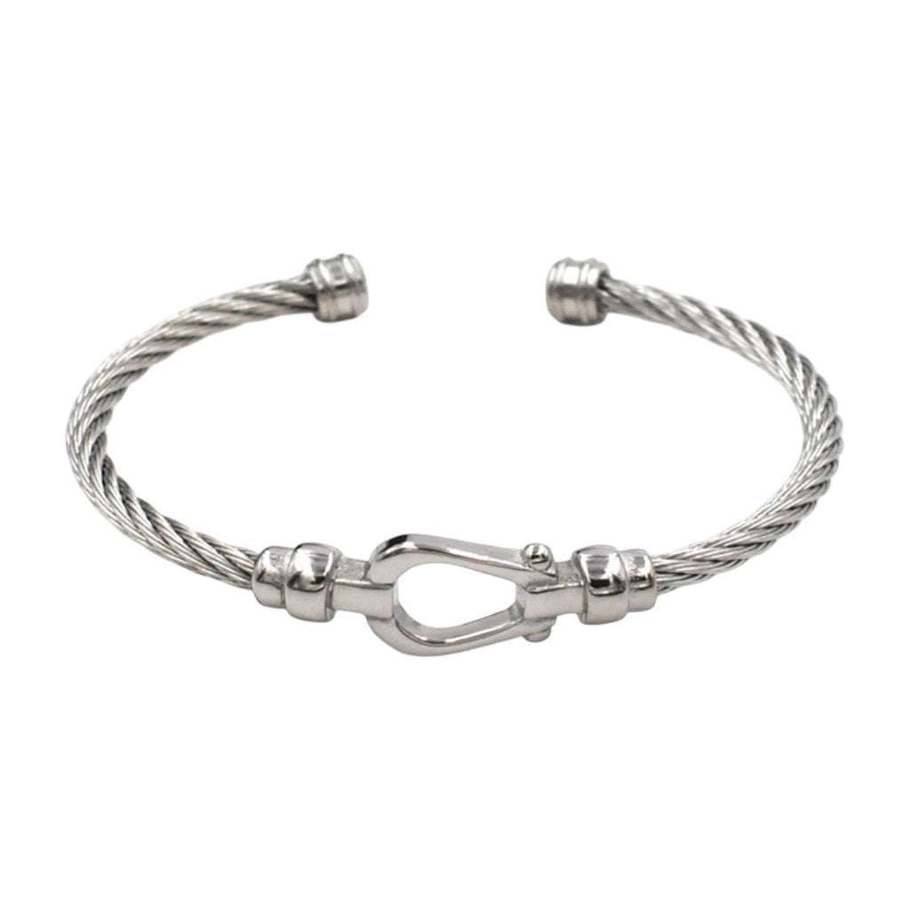 Bracelet jonc en acier inoxydable torsadé argenté avec fermoir fer à cheval élégant.