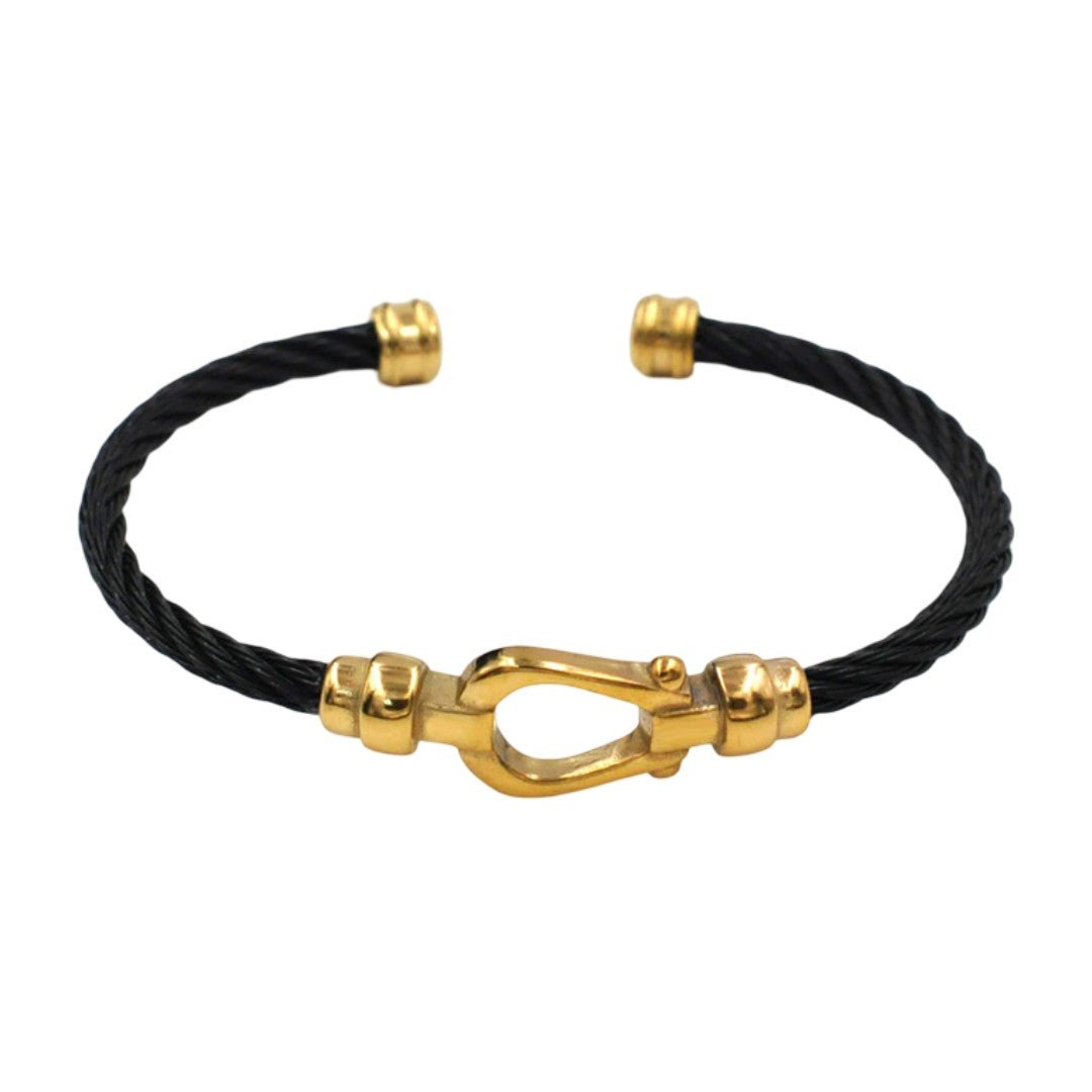 Bracelet jonc femme en câble acier inoxydable noir, fermoir doré en forme de fer à cheval.