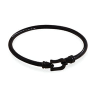 Bracelet fer à cheval noir en acier inoxydable avec fermoir ajustable pour femme.