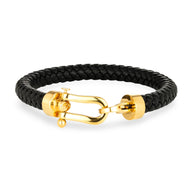 Bracelet homme en cuir noir tressé avec fermoir en acier inoxydable doré en forme de fer à cheval.