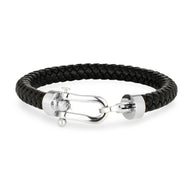 Bracelet homme en cuir noir tressé avec fermoir en acier inoxydable argenté forme fer à cheval.