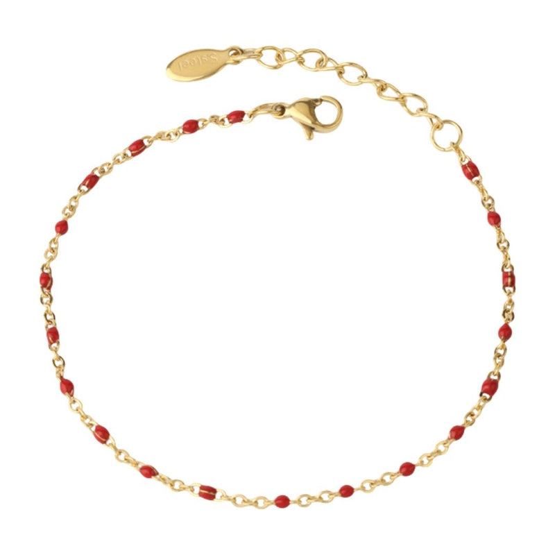 Bracelet fin doré en acier inoxydable, maille forçat, perles rouges espacées, fermoir mousqueton réglable.