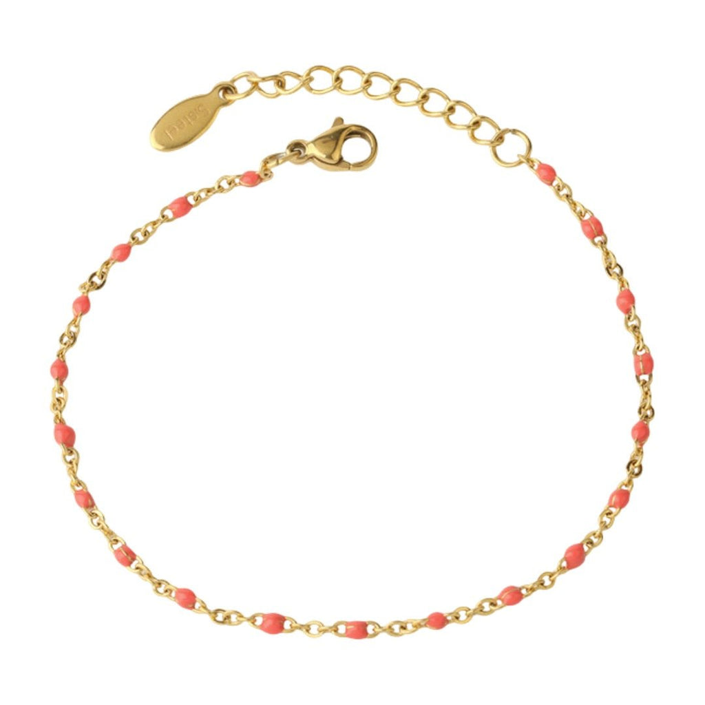 Bracelet fin en acier doré avec maille forçat et petites perles rouges, fermoir mousqueton réglable.