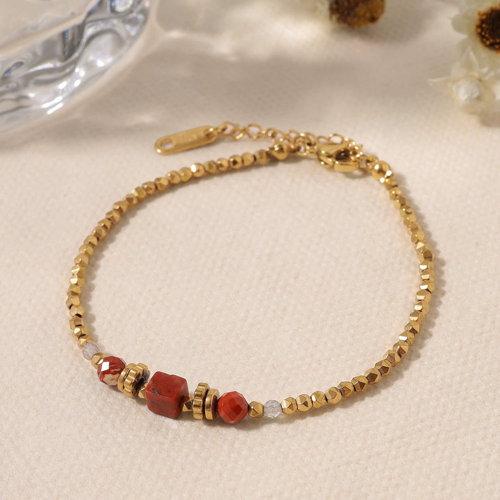 Pulsera fina para mujer de acero inoxidable, adornada con perlas doradas, realzada con jaspe rojo y decorada con cristales brillantes, ideal para un estilo elegante, modelo Valène