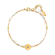 Bracelet en argent sterling avec petite fleur de printemps dorée et perles colorées fines.