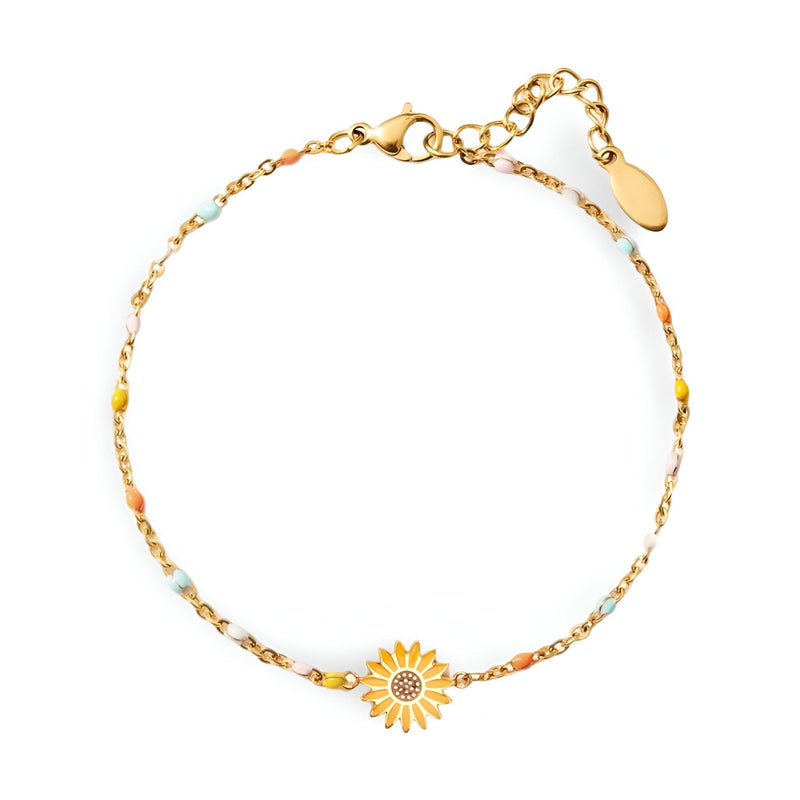 Bracelet en argent sterling avec petite fleur de printemps dorée et perles colorées fines.