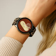 Bracelet Garmin en nylon tissé motif léopard beige et noir avec boucle coulissante pour montre connectée, style femme.