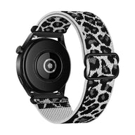 Bracelet Garmin en nylon tissé motif léopard noir et blanc avec boucle coulissante, modèle Zorus pour femme.
