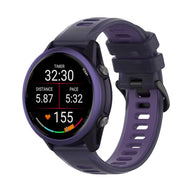 Bracelet de montre Garmin Gus violet en silicone avec design aéré, fermeture rapide et boucle noire.