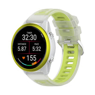 Bracelet de montre silicone vert clair et blanc avec design perforé et boucle métallique argentée.