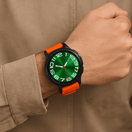 Bracelet de montre Garmin sportif orange en nylon résistant avec boucle noire à attache rapide.
