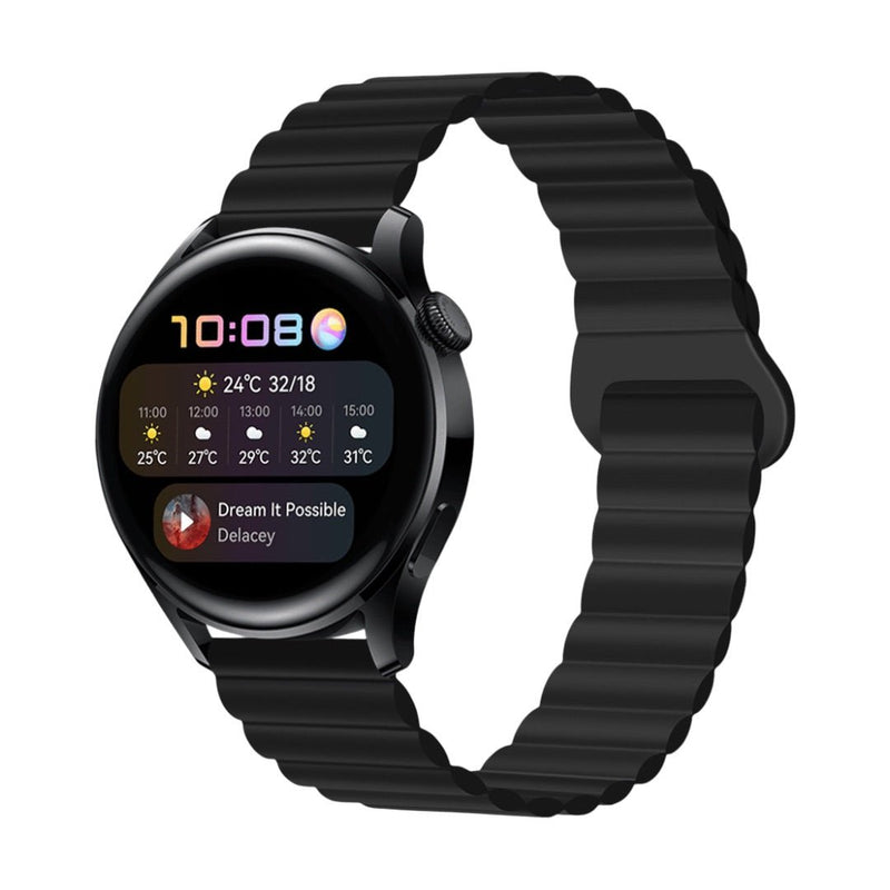 Bracelet montre Garmin en silicone noir à libération rapide avec boucle magnétique, rainures ondulées, style moderne.