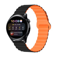 Bracelet silicone magnétique bicolore noir et orange, 20mm/22mm, design moderne et ajustable pour montre connectée Garmin.